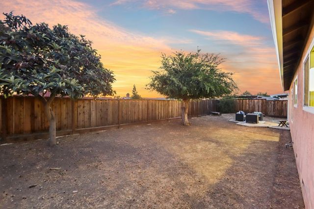 a view of a house with a patio