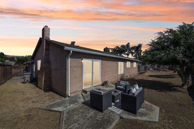 an aerial view of multiple houses with outdoor space