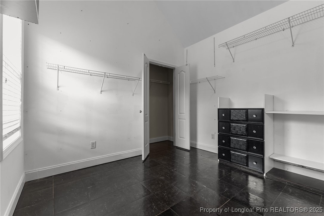 315 St Johns Loop Raeford, NC 28376 - Photo 23 of 47 a view of an empty walk in closet