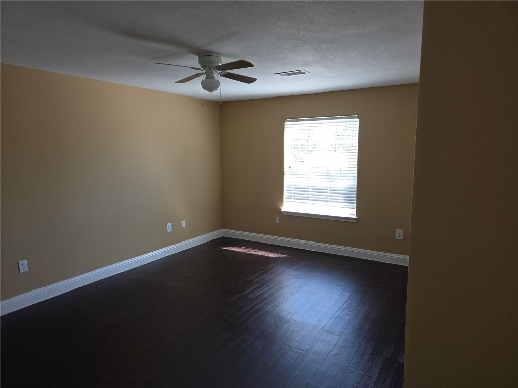 7709 Rhobell Street, Unit B Houston, TX 77016 - Photo 15 of 21 a view of an empty room and a window