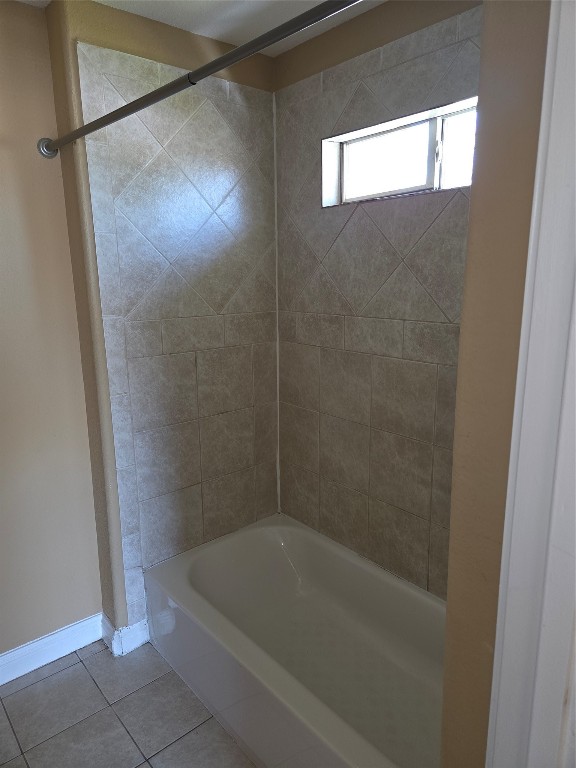 7709 Rhobell Street, Unit B Houston, TX 77016 - Photo 17 of 21 a bathroom with a tub and a shower