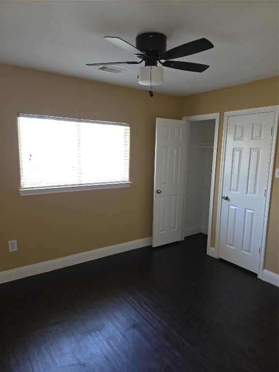7709 Rhobell Street, Unit B Houston, TX 77016 - Photo 20 of 21 a view of an empty room with wooden floor and a window