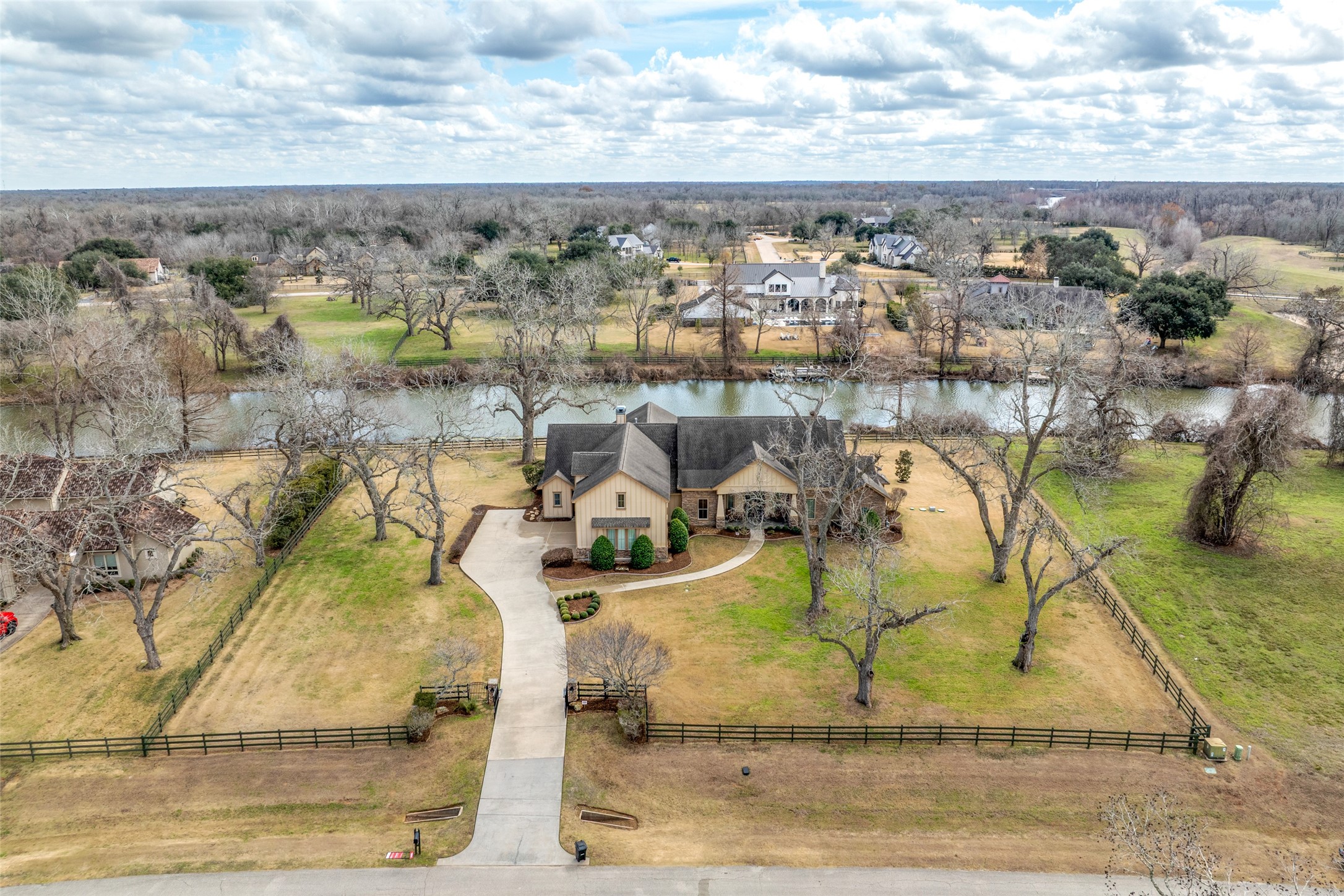 31102 Lower Oxbow Trace Fulshear, TX 77441 - Photo 45 of 50 Fabulous 1.16 acre lot with mature plants & trees on Oxbow Lake. This will all turn green and will be fabulous come Spring!