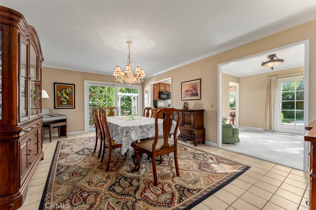 19512 Sierra Mia Road Irvine, CA 92603 - Photo 11 of 46 a view of a dining room with furniture