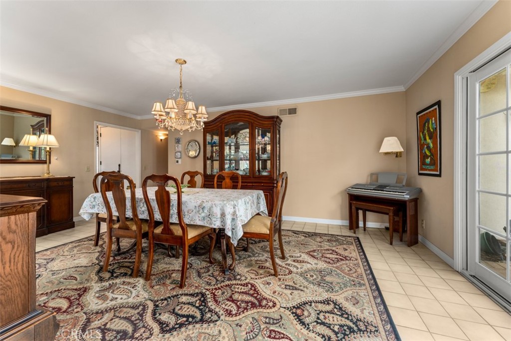 19512 Sierra Mia Road Irvine, CA 92603 - Photo 12 of 46 a view of a dining room with furniture