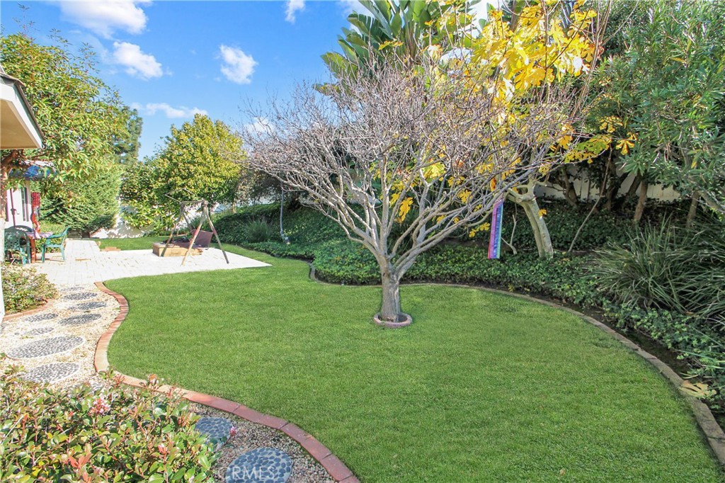 19512 Sierra Mia Road Irvine, CA 92603 - Photo 2 of 46 a view of a garden with a tree