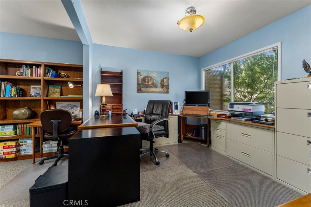 19512 Sierra Mia Road Irvine, CA 92603 - Photo 26 of 46 a view of a workspace with furniture and a window
