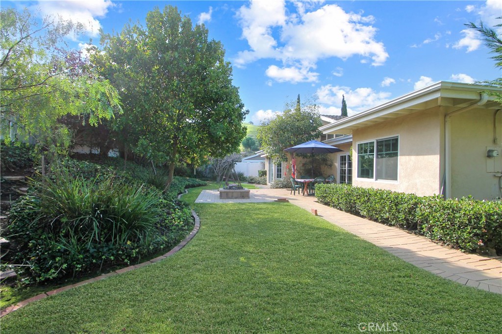 19512 Sierra Mia Road Irvine, CA 92603 - Photo 35 of 46 a house view with a garden space