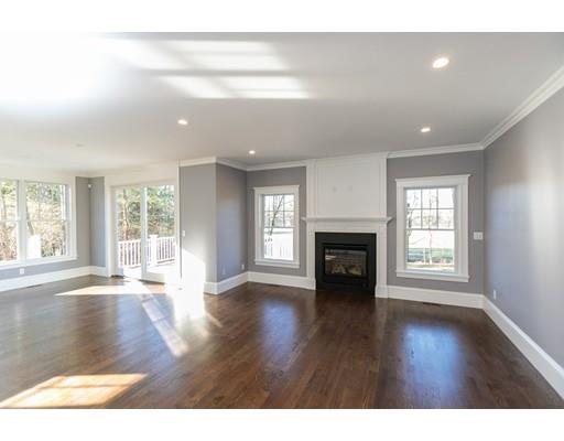 100 Elmwood Road Wellesley, MA 02481 - Photo 15 of 27 a view of an empty room with wooden floor and a window