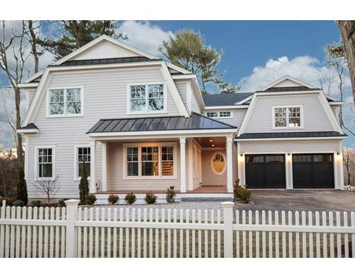 100 Elmwood Road Wellesley, MA 02481 - Photo 2 of 27 a view of a brick house with large windows