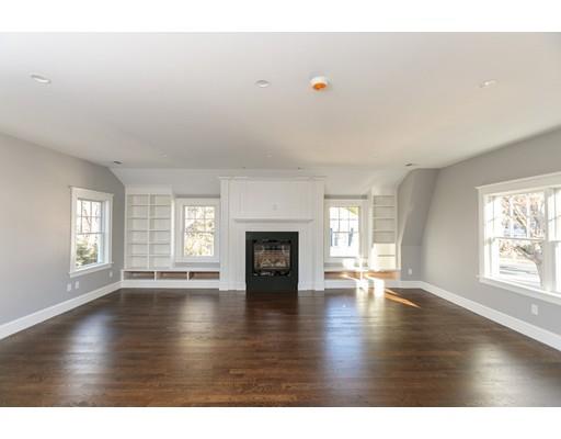 100 Elmwood Road Wellesley, MA 02481 - Photo 22 of 27 a view of an empty room with window and wooden floor