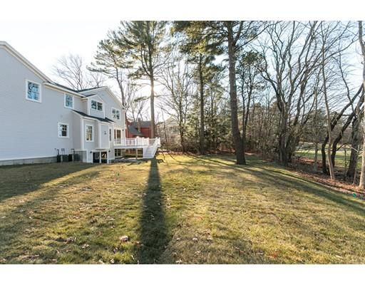 100 Elmwood Road Wellesley, MA 02481 - Photo 26 of 27 a swimming pool with yard and trees in the background