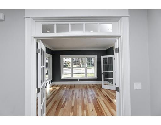 100 Elmwood Road Wellesley, MA 02481 - Photo 8 of 27 a view of an empty room with wooden floor and a window