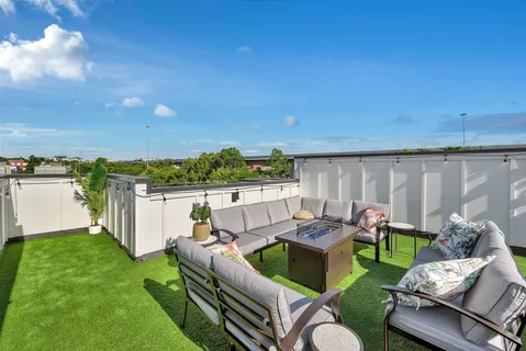 a outdoor living space with furniture and garden