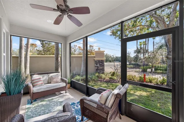 a living room with large windows