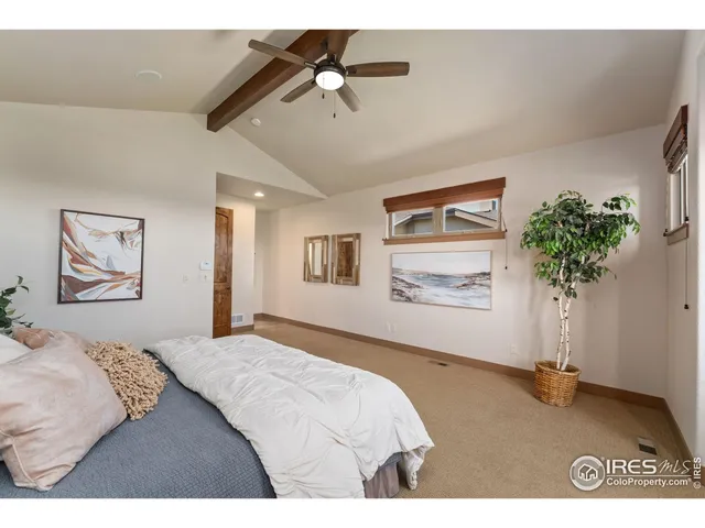 a bathroom with a shower and a sink