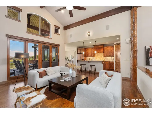 a very nice looking living room with a large window