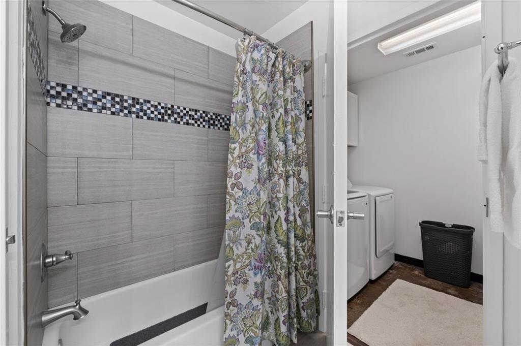 5200 Peachtree Road, Unit 2114 Chamblee, GA 30341 - Photo 12 of 26 a bathroom with a shower