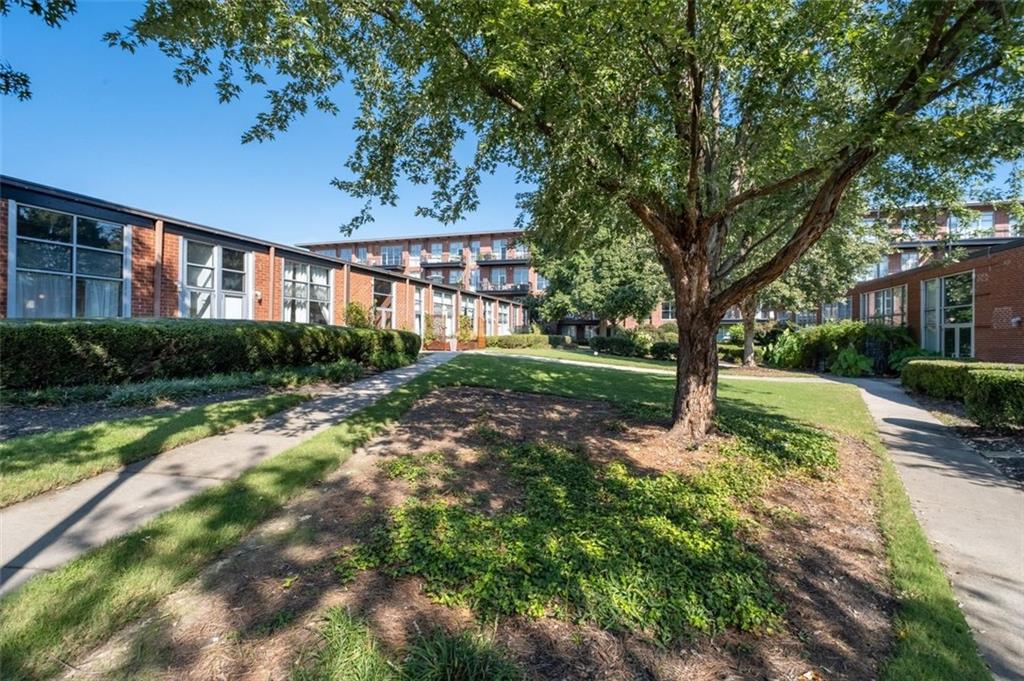 5200 Peachtree Road, Unit 2114 Chamblee, GA 30341 - Photo 25 of 26 a view of a house with a yard