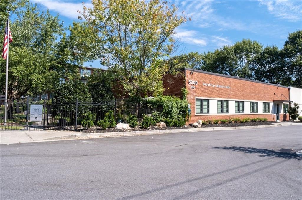 5200 Peachtree Road, Unit 2114 Chamblee, GA 30341 - Photo 26 of 26 a front view of a house with a garden