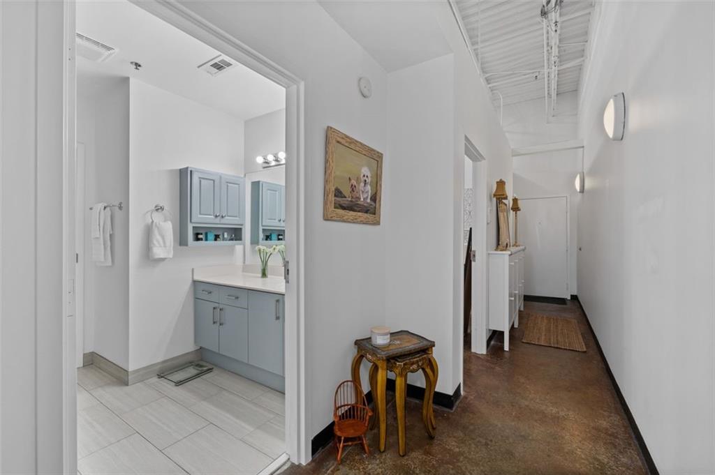 5200 Peachtree Road, Unit 2114 Chamblee, GA 30341 - Photo 9 of 26 a bathroom with a sink and a mirror