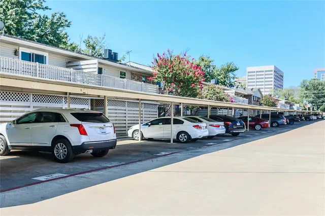 a front view of a house with parking space
