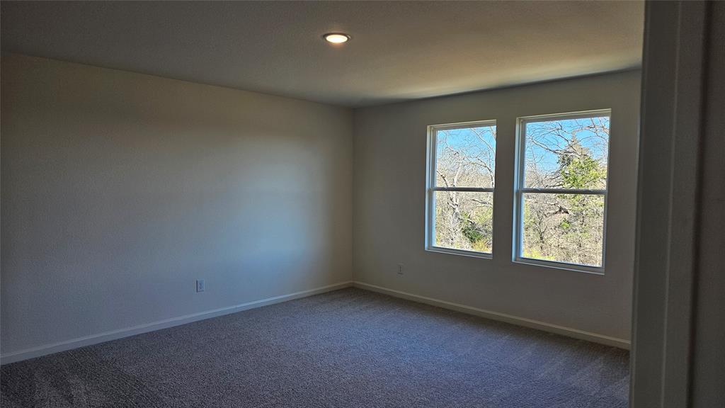 2102 Prairie Lane Melissa, TX 75454 - Photo 11 of 32 an empty room with a window