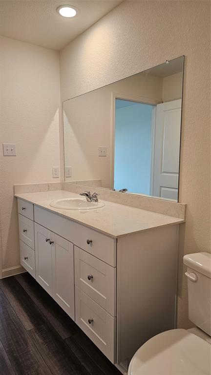 2102 Prairie Lane Melissa, TX 75454 - Photo 15 of 32 a bathroom with a sink and mirror