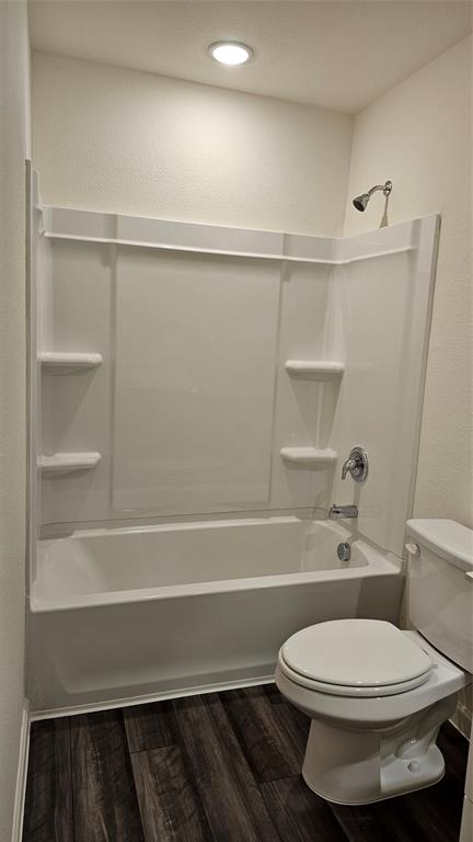 2102 Prairie Lane Melissa, TX 75454 - Photo 20 of 32 a bathroom with a toilet and a bathtub