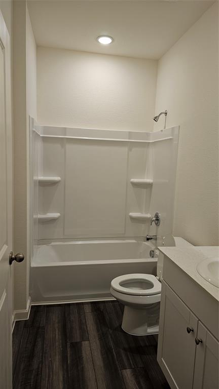 2102 Prairie Lane Melissa, TX 75454 - Photo 6 of 32 a bathroom with a sink a toilet and shower