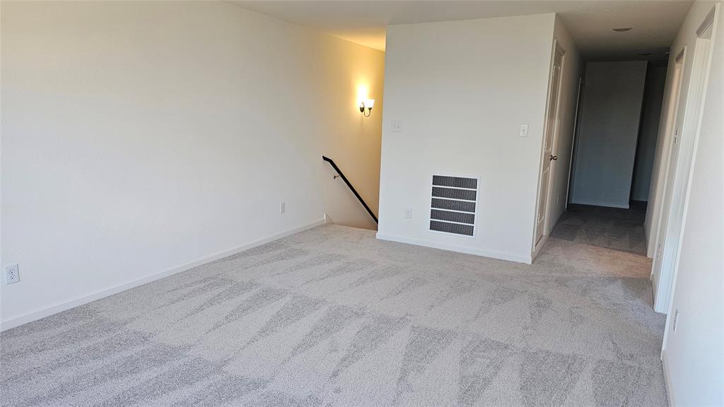 2102 Prairie Lane Melissa, TX 75454 - Photo 9 of 32 an empty room with windows and entryway