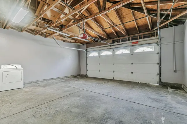 a view of a room with white walls