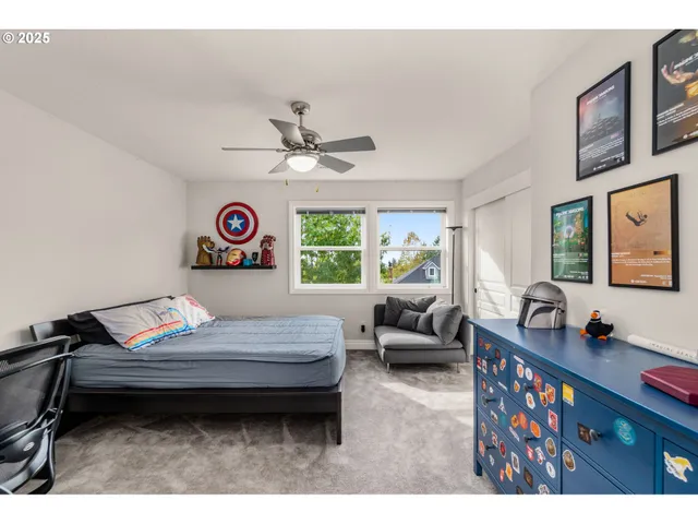 a bedroom with furniture and a window