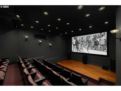 a view of a room with furniture and screen