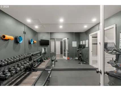 a view of a room with gym equipment