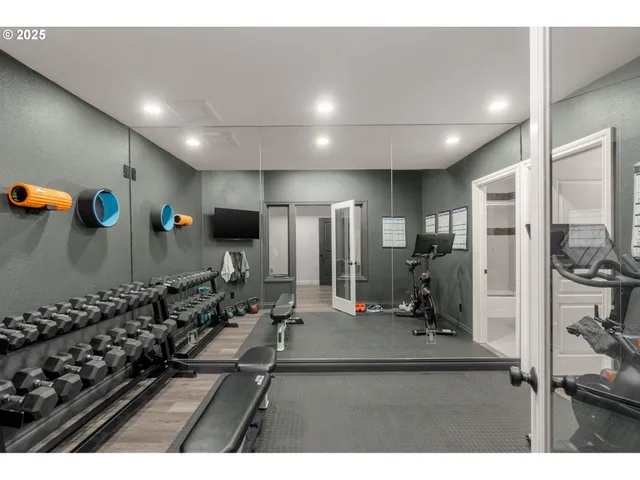 a view of a room with gym equipment