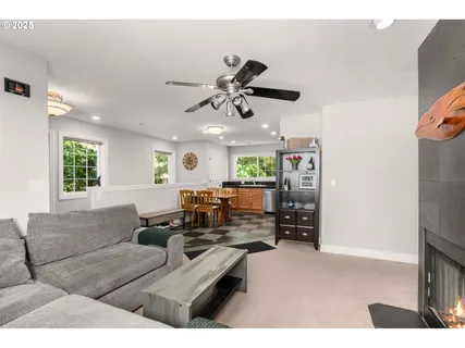 a living room with furniture and a window