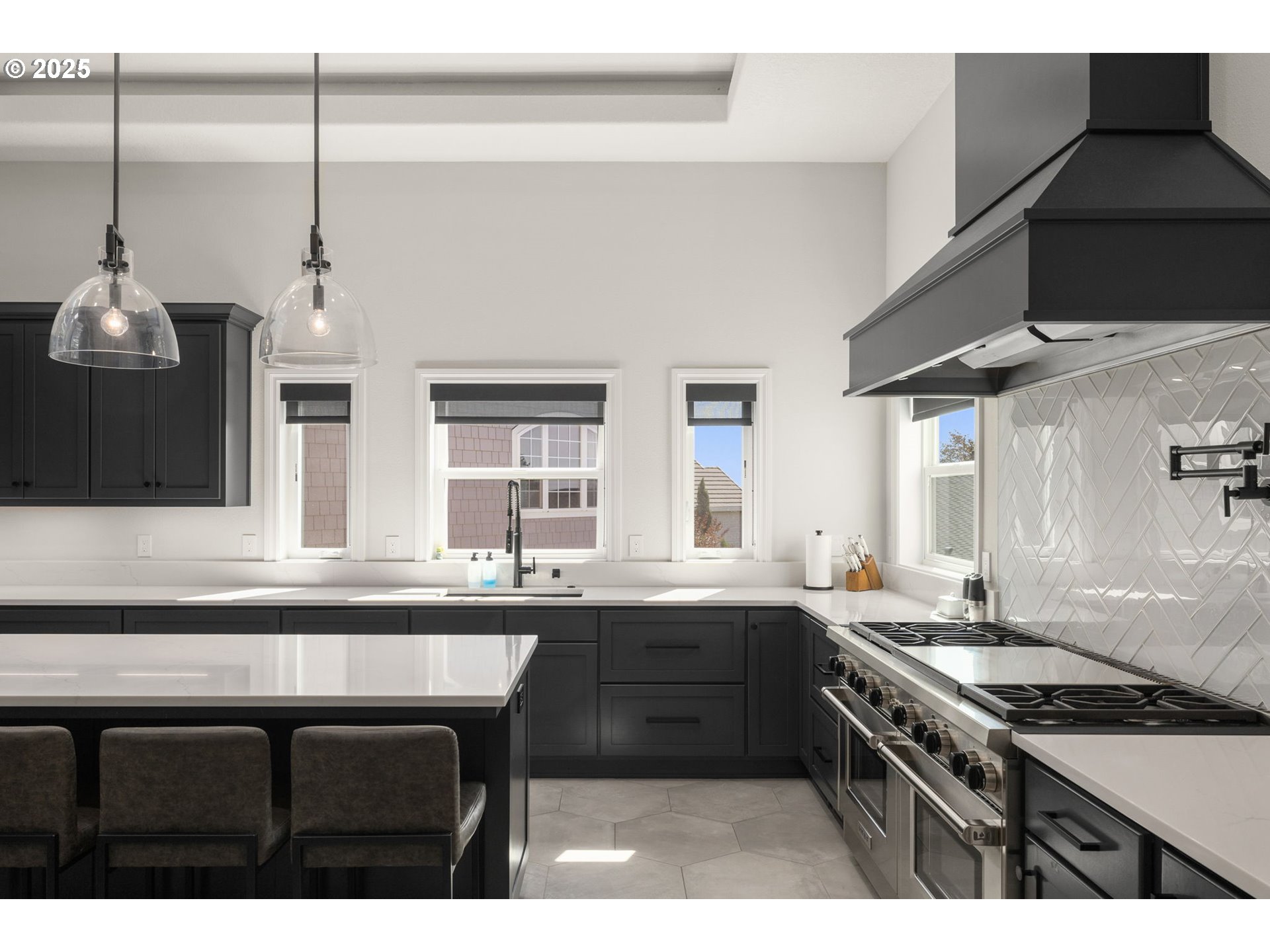 3720 Northwest Devoto Lane Portland, OR 97229 - Photo 8 of 44 a kitchen with stainless steel appliances a sink stove and cabinets