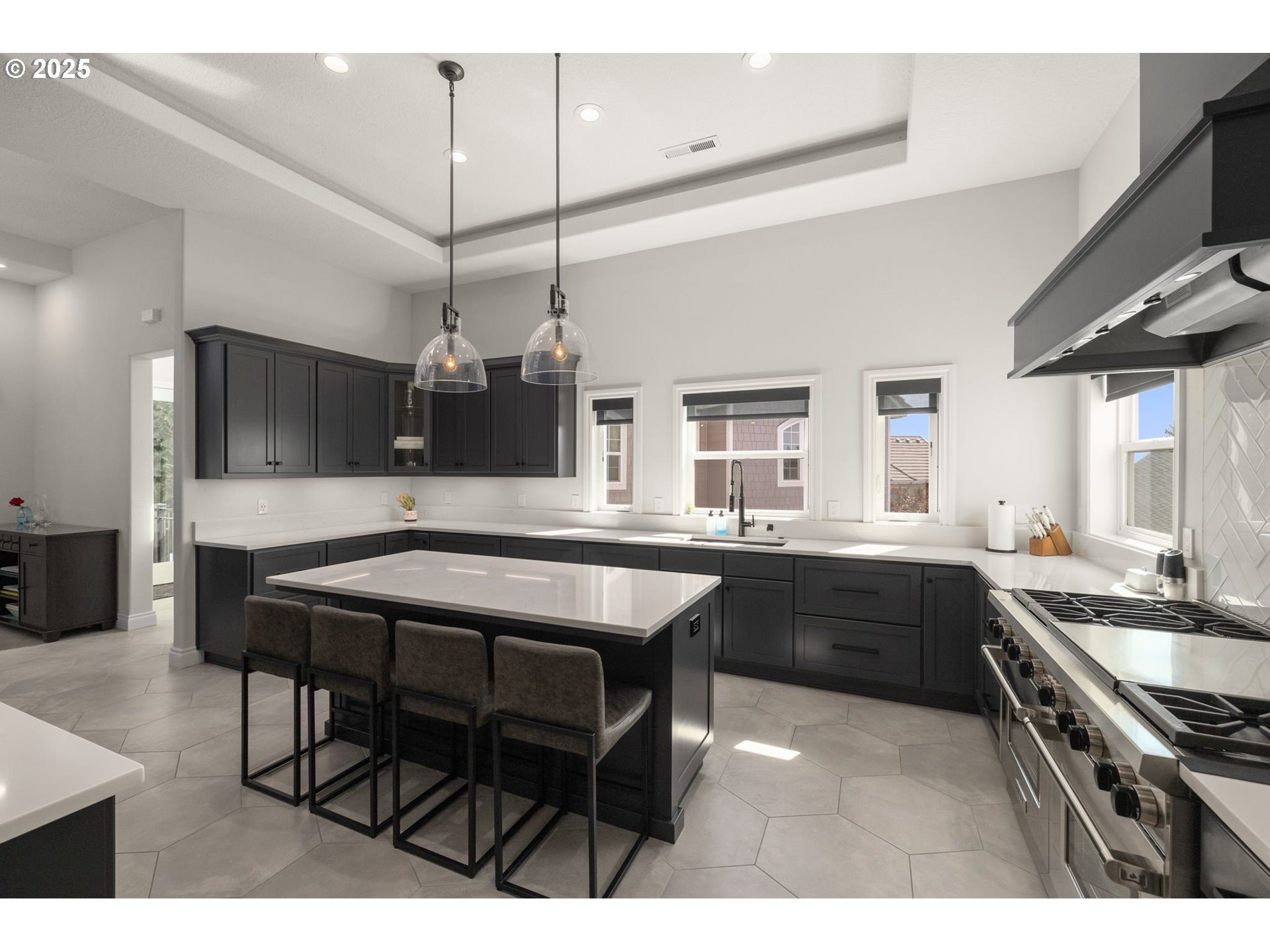 3720 Northwest Devoto Lane Portland, OR 97229 - Photo 9 of 44 a kitchen with a table and chairs in it