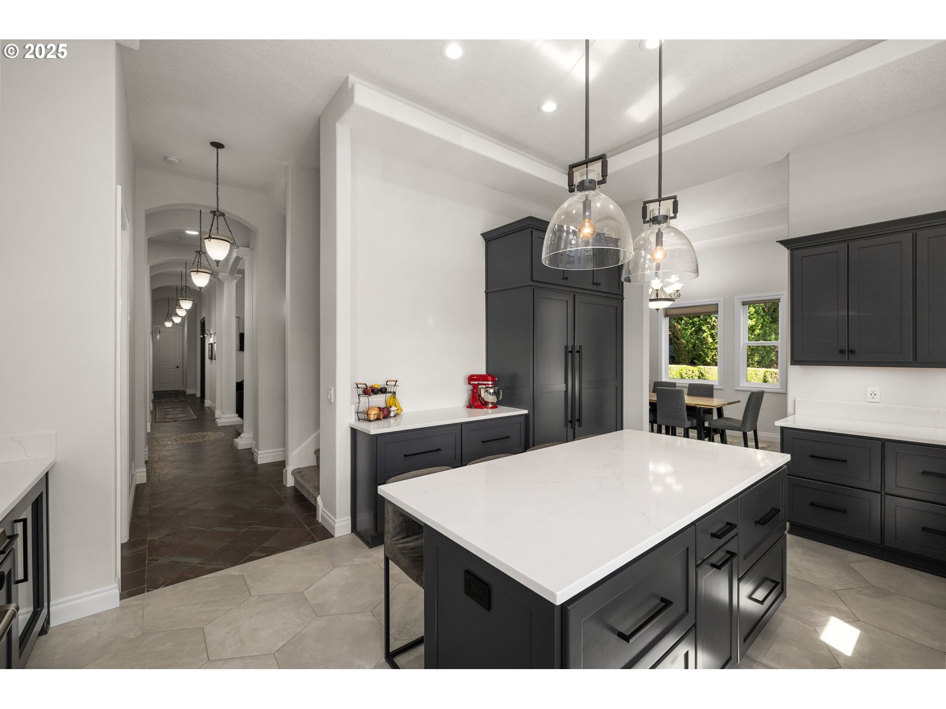 3720 Northwest Devoto Lane Portland, OR 97229 - Photo 10 of 44 a kitchen with a table and chairs