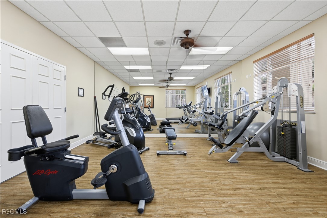 14951 Reflection Key Circle, Unit 536 Fort Myers, FL 33907 - Photo 32 of 36 a view of a room with gym equipment