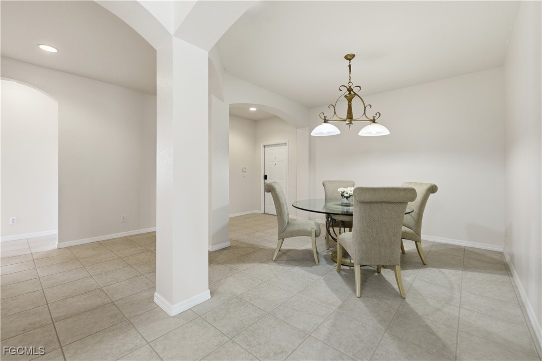 14951 Reflection Key Circle, Unit 536 Fort Myers, FL 33907 - Photo 5 of 36 a dining room well furnished