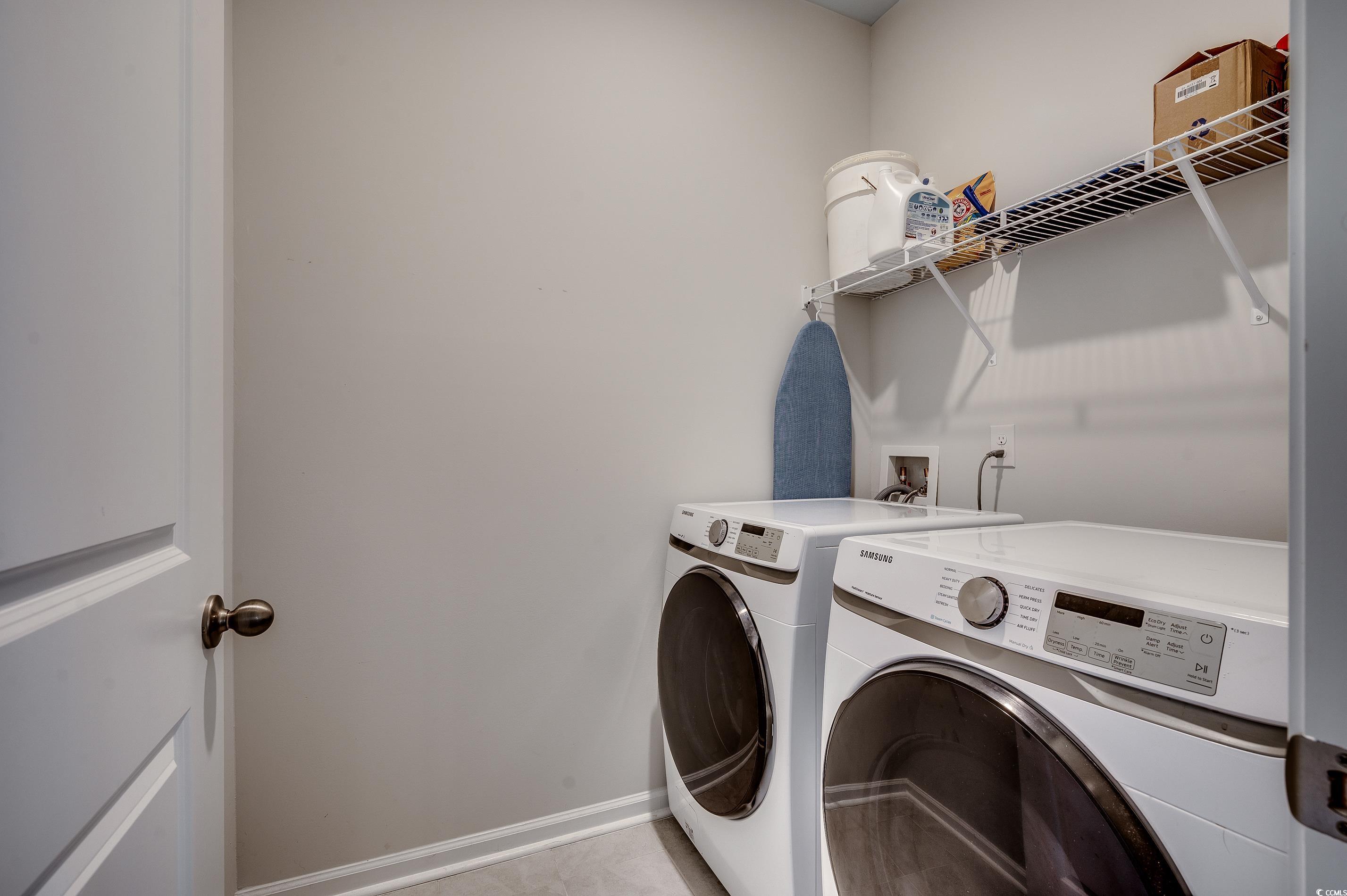 2924 Skylar Drive Myrtle Beach, SC 29577 - Photo 19 of 30 Washroom featuring washing machine and dryer and baseboards