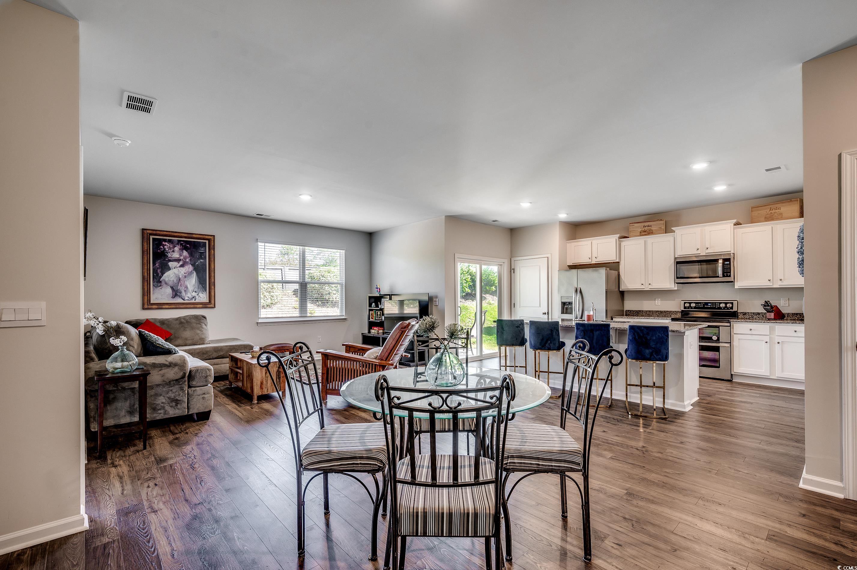 2924 Skylar Drive Myrtle Beach, SC 29577 - Photo 8 of 30 Dining room featuring dark wood-type flooring and recessed lighting