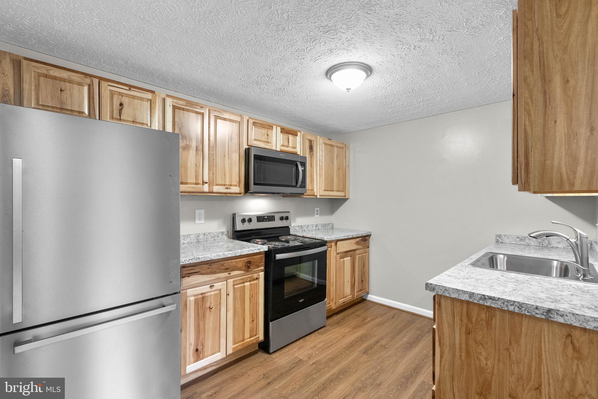3925 Greencastle Road, Unit 103 Burtonsville, MD 20866 - Photo 8 of 24 Kitchen