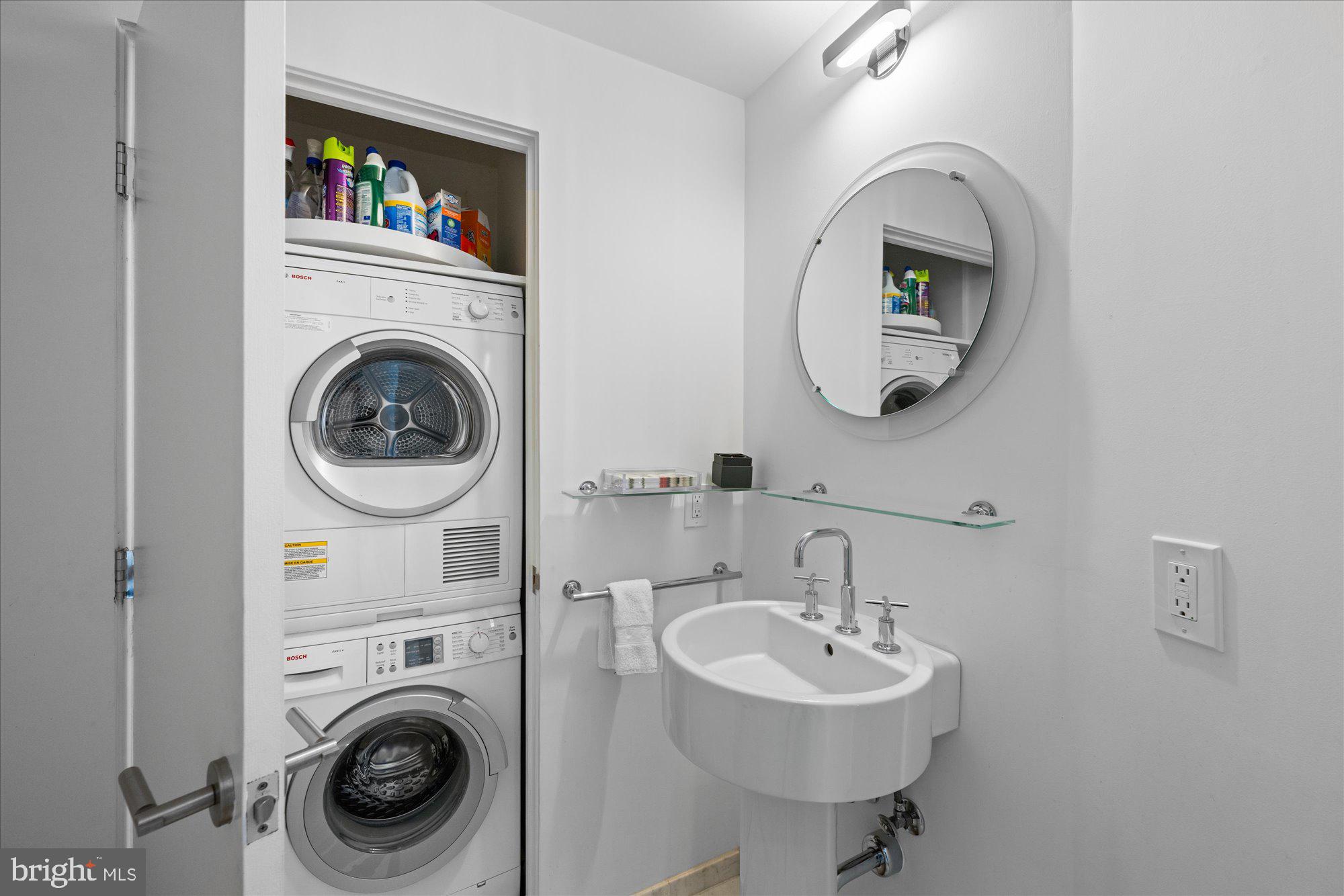 4750 41st Street Northwest, Unit 507 Washington, DC 20016 - Photo 21 of 50 a bathroom with a sink and a mirror