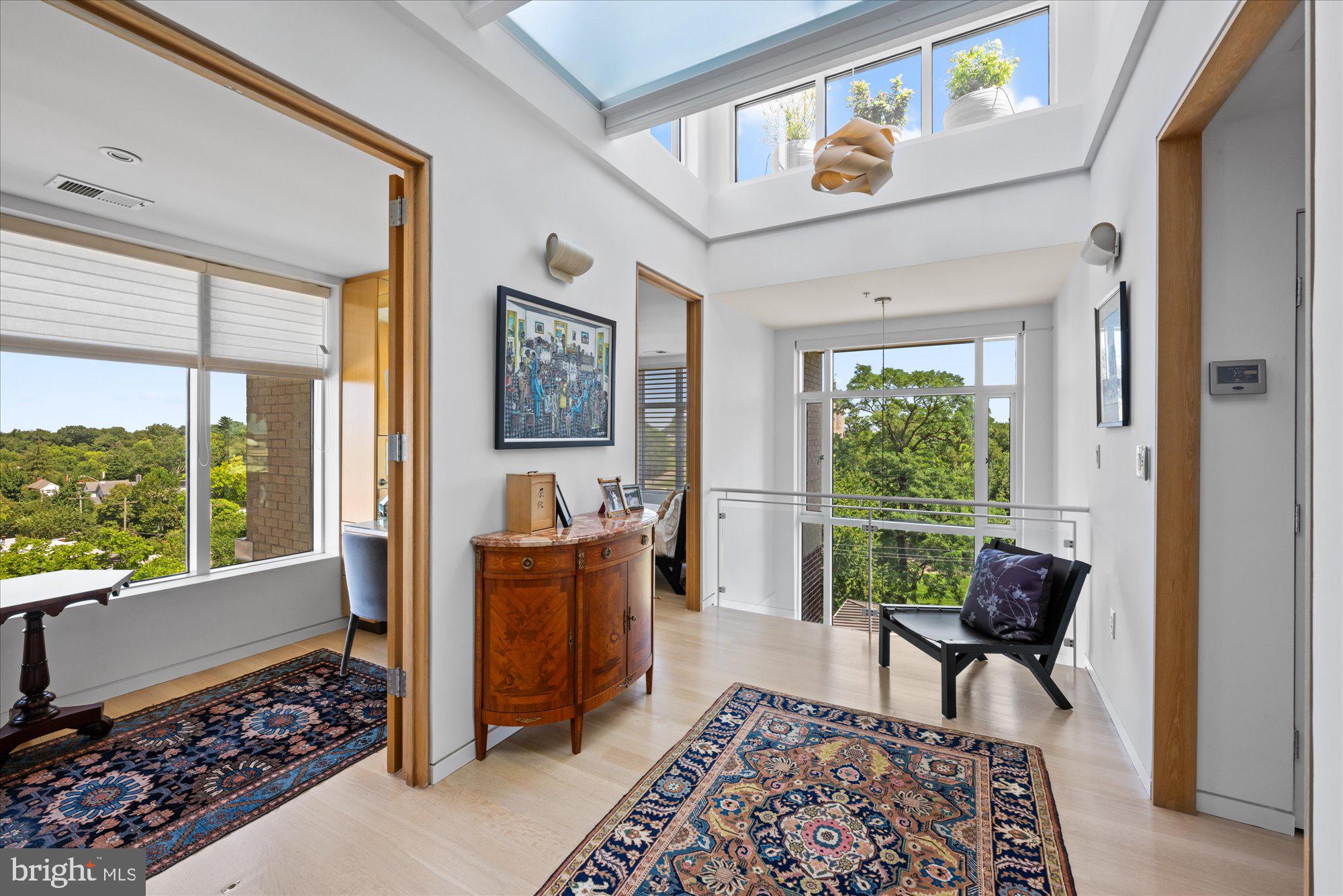 4750 41st Street Northwest, Unit 507 Washington, DC 20016 - Photo 23 of 50 a living room with furniture and a window