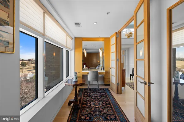 a bedroom with furniture and a window