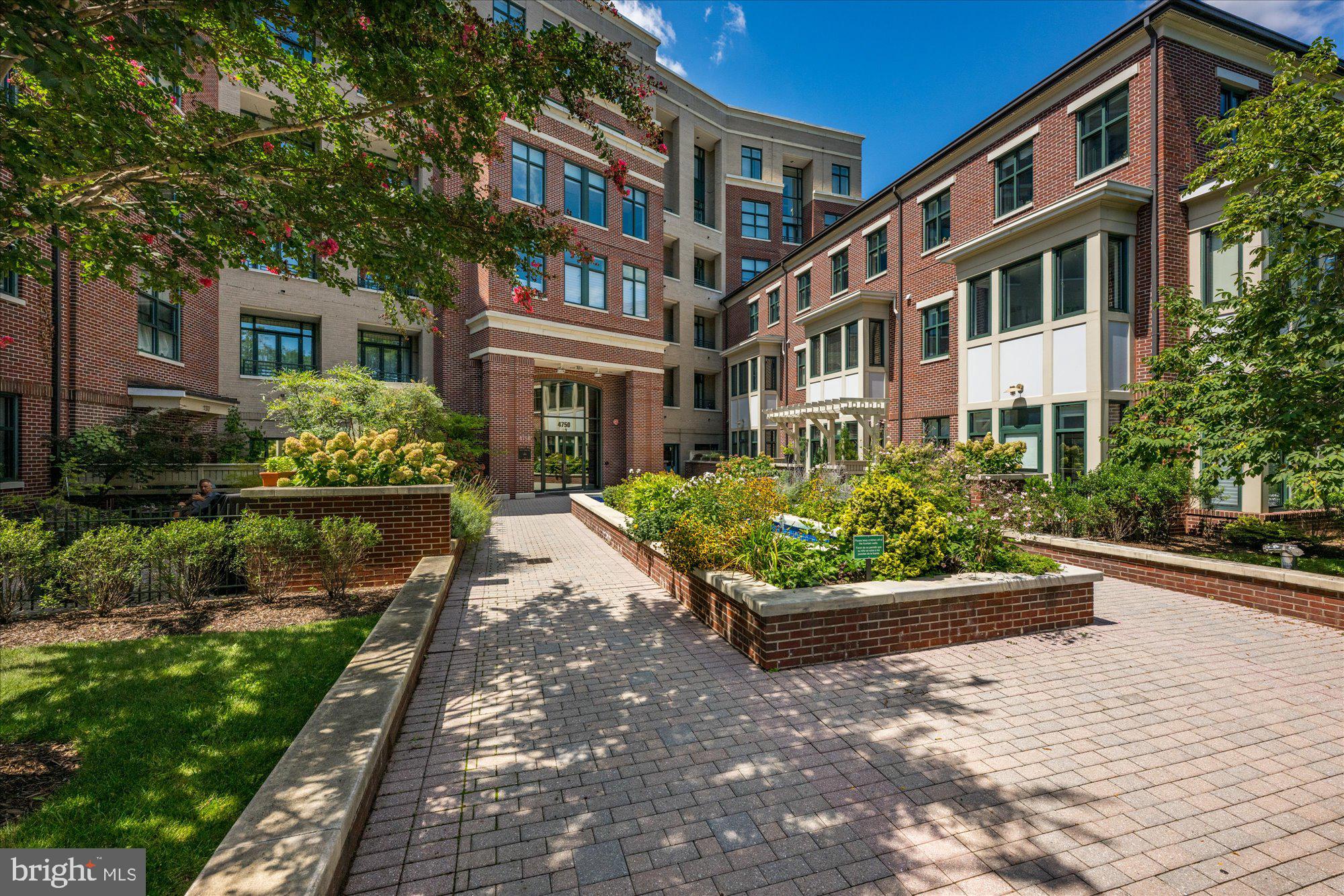 4750 41st Street Northwest, Unit 507 Washington, DC 20016 - Photo 3 of 50 a view of a building with a garden