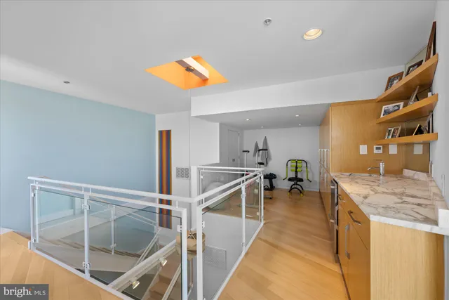 a view of a kitchen with furniture and a window